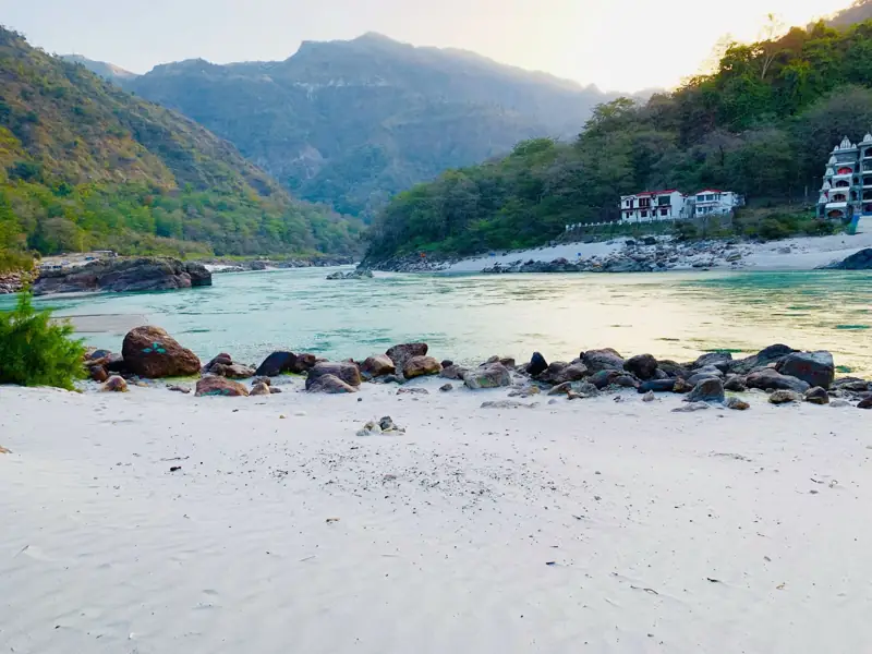 White sand beach along the turquoise Ganga