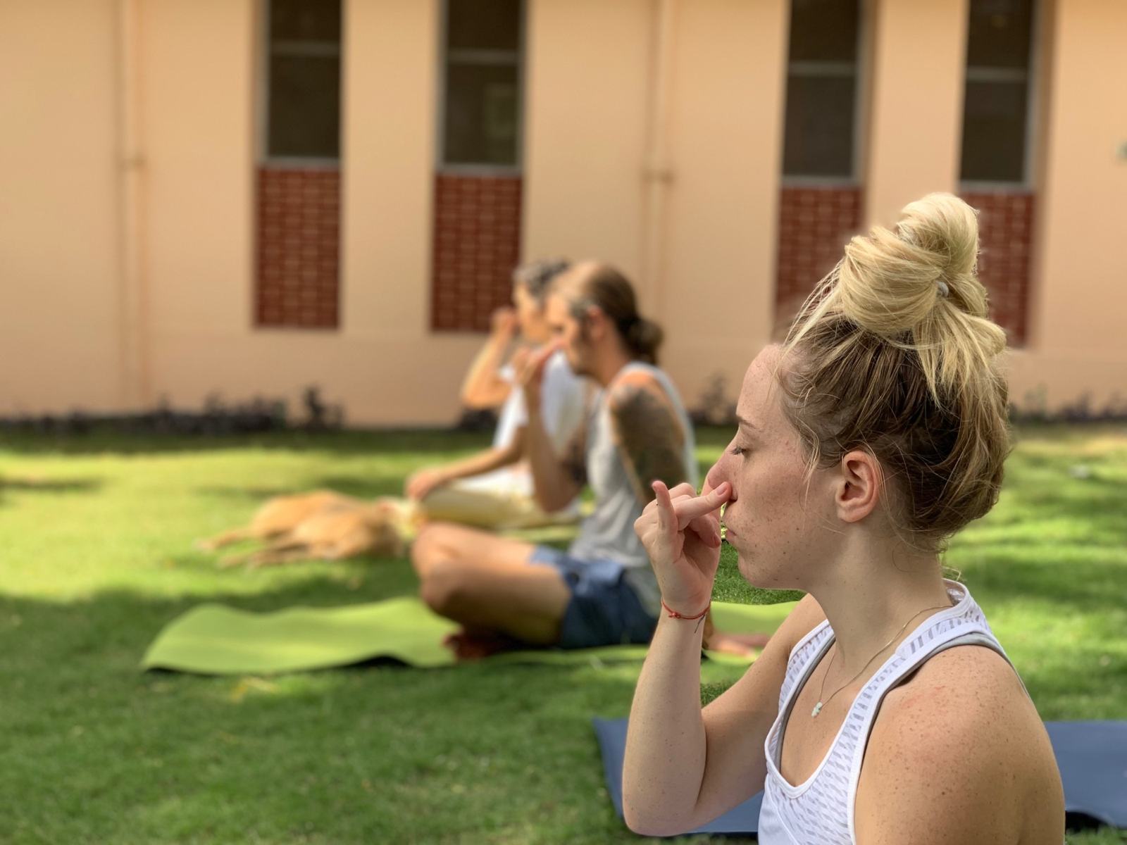 Pranayama practice on the ashram lawn