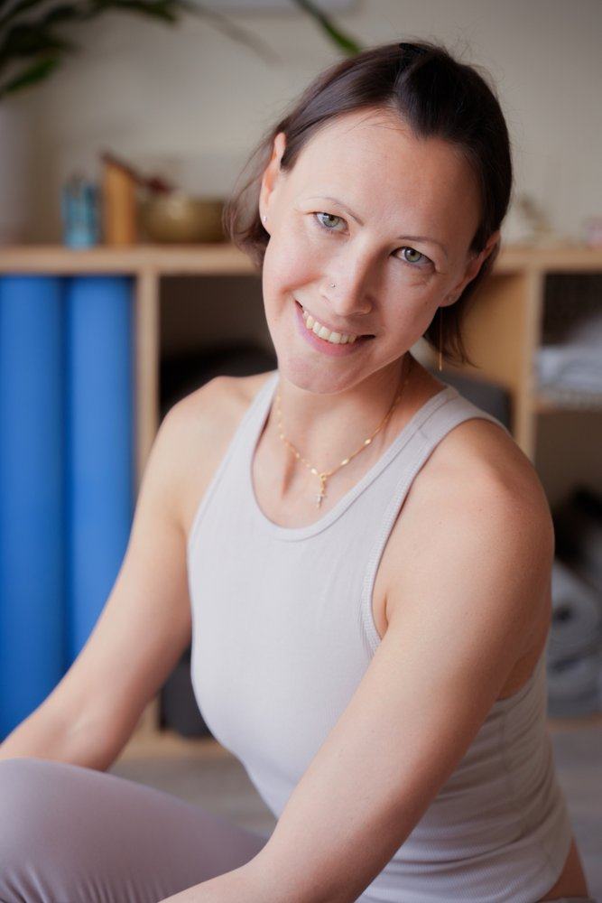 Olga Klishina smiling in the studio